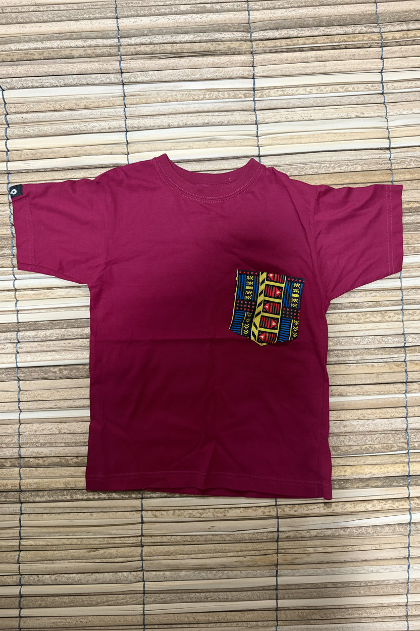 Camiseta infantil talla 12. COLOR VINOTINTO CON BOLSILLO- 100% algodón