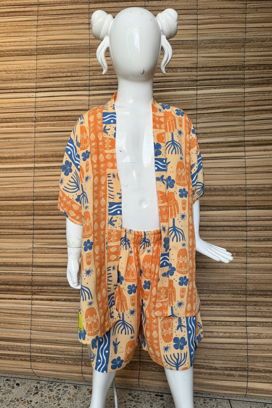 Maniquí niña con moños - naranja afrocolombiano